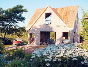 
Cut in basic shapes, SIPs serve triple duty as the framing, insulation and sheeting for the walls and roof of the author's workshop. Notice how the roof sections have been numbered for easy placement.
